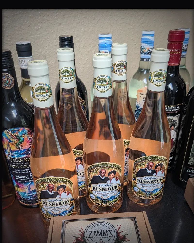 Bottles with Runner Up labels behind a presentation box