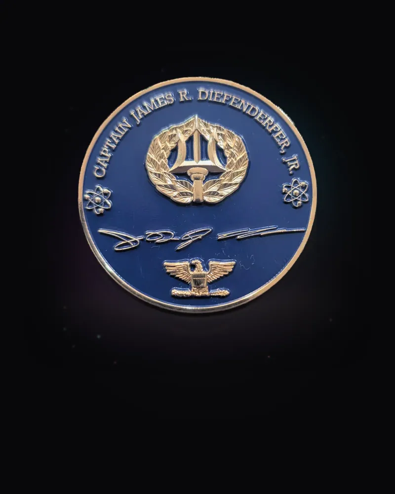 Front of a blue military challenge coin