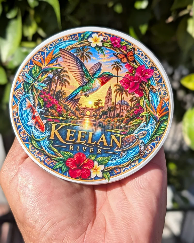 Keelan River hummingbird coaster held up outdoors